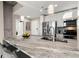 Modern kitchen features stainless steel appliances and granite countertops at 3324 Peachtree Ne Rd # 1114, Atlanta, GA 30326