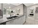 Modern kitchen with double sink and stylish cabinetry at 3324 Peachtree Ne Rd # 1114, Atlanta, GA 30326