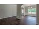 Bright dining room with hardwood floors and large window at 459 Benson Meadows Dr, Dallas, GA 30157