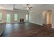 Open concept living area with a fireplace, hardwood floors, and lots of natural light at 459 Benson Meadows Dr, Dallas, GA 30157