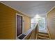 Inviting hallway featuring a stained front door and access to outdoor stairs at 533 Bentley Pl, Tucker, GA 30084