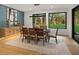 Elegant dining room with hardwood floors and large windows at 200 Simonton Rd, Lawrenceville, GA 30046