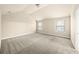 Spacious bedroom with neutral carpeting and high ceilings at 4860 Longview Run, Decatur, GA 30035