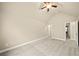 Spacious bedroom with ceiling fan and carpet flooring at 4860 Longview Run, Decatur, GA 30035