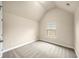 Bright bedroom with vaulted ceilings and carpet at 4860 Longview Run, Decatur, GA 30035