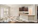 Kitchen with granite countertops and dark brown cabinets at 4860 Longview Run, Decatur, GA 30035