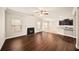 Open living room with a fireplace and hardwood floors at 4860 Longview Run, Decatur, GA 30035