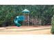 Community playground with a slide and climbing structure at 4860 Longview Run, Decatur, GA 30035