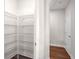 Spacious pantry with ample shelving for storage at 6850 Canyon Creek Way, Cumming, GA 30028