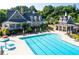 Community pool with clubhouse and lounge area at 6850 Canyon Creek Way, Cumming, GA 30028