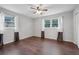 Bright bedroom with wood-look floors and large windows at 785 Mckenzie Sw Ct, Atlanta, GA 30311