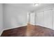 Spacious bedroom with wood-look floors and closets at 785 Mckenzie Sw Ct, Atlanta, GA 30311