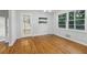 Simple dining room with hardwood floors and built-in shelving at 785 Mckenzie Sw Ct, Atlanta, GA 30311