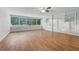 Spacious living area with hardwood floors and an exposed brick wall at 785 Mckenzie Sw Ct, Atlanta, GA 30311