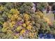 Aerial view of wooded lot near commercial area at 157 New Hope Rd, Fayetteville, GA 30214