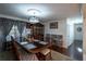 Bright dining room with elegant table and hardwood floors at 157 New Hope Rd, Fayetteville, GA 30214