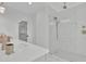 Modern bathroom with a large walk-in shower and white marble tile at 332 Sugarview Rd # 16, Sugar Hill, GA 30518