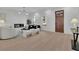 Bright living room with fireplace and hardwood floors at 332 Sugarview Rd # 16, Sugar Hill, GA 30518