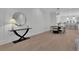 Light and airy living room with hardwood floors and stylish furniture at 332 Sugarview Rd # 16, Sugar Hill, GA 30518