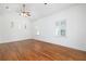 Spacious primary bedroom with hardwood floors and high ceilings at 1441 Etowah Ne Dr, Atlanta, GA 30319