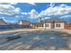 Home with covered patio, basketball court, and yard at 2105 Rock Ct, Loganville, GA 30052