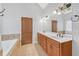 Bathroom with a large walk-in shower and tile surround at 2105 Rock Ct, Loganville, GA 30052