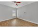 Bedroom with hardwood floors and ceiling fan at 2105 Rock Ct, Loganville, GA 30052