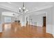 Spacious dining room with hardwood floors and chandelier at 2105 Rock Ct, Loganville, GA 30052