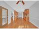 Bright dining room with hardwood floors and access to the kitchen at 2105 Rock Ct, Loganville, GA 30052