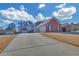 Home with long driveway and detached garage at 2105 Rock Ct, Loganville, GA 30052