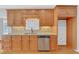 Modern kitchen with granite countertops and oak cabinets at 2105 Rock Ct, Loganville, GA 30052