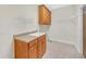 Laundry room with built-in cabinets and shelving at 2105 Rock Ct, Loganville, GA 30052