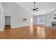 Large living area with hardwood floors and a cozy fireplace at 2105 Rock Ct, Loganville, GA 30052