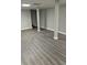 Spacious basement featuring gray flooring and freshly painted walls; ready for customization at 6494 Pleasant Dr, Winston, GA 30187
