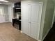 Kitchen with white pantry and tile floor at 6494 Pleasant Dr, Winston, GA 30187