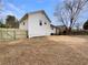 House's backyard features a deck and a wooden fence at 108 Ridgefield Dr, Douglasville, GA 30134