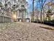 Large backyard with shed and wooded area at 414 Deering Dr, Douglasville, GA 30134