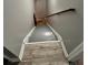 Basement stairs with gray painted steps and wood flooring at 414 Deering Dr, Douglasville, GA 30134