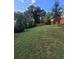 Large backyard with a wooden privacy fence at 151 Roy St # A & B, Canton, GA 30114