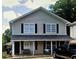 Two-story duplex with covered porches and a spacious yard at 151 Roy St # A & B, Canton, GA 30114