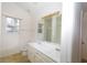 Double vanity bathroom with a shower and toilet at 190 Wynfield Dr, Covington, GA 30016