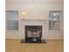 Living room with a marble fireplace and neutral decor at 190 Wynfield Dr, Covington, GA 30016