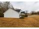 Side view of a single-story house with mature landscaping at 190 Wynfield Dr, Covington, GA 30016