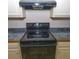 Close-up of kitchen stove and countertops at 190 Wynfield Dr, Covington, GA 30016