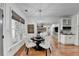 Charming dining room with a round table and hardwood floors at 3350 Vista Creek Dr, Dacula, GA 30019