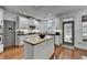 Modern kitchen with white cabinets, butcher block island, and stainless steel appliances at 3350 Vista Creek Dr, Dacula, GA 30019