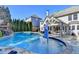 Stunning in-ground pool with a blue umbrella at 3350 Vista Creek Dr, Dacula, GA 30019