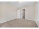 Bedroom with neutral carpet and access to hallway at 960 N Grand Nw Ave, Atlanta, GA 30318