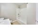 Clean bathroom with a tub shower combo and tile floors at 2600 Nw Baker Rd, Atlanta, GA 30318