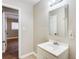 Bathroom with vanity, mirror and access to bedroom at 2600 Nw Baker Rd, Atlanta, GA 30318